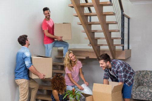Professional packing services in Ham preparing boxes for a move