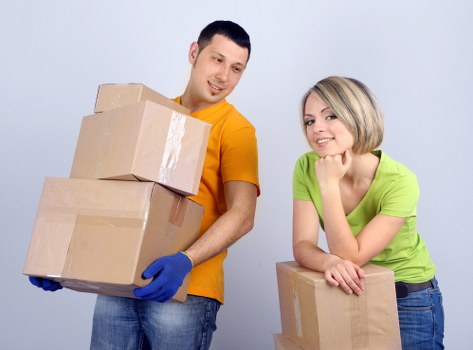 A removals team transporting household items in Ham