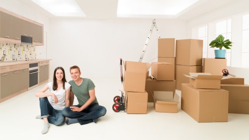 Packed boxes ready for flat removals in Ham